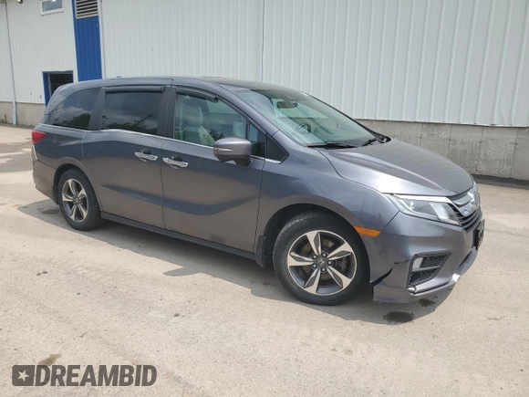 2018 Honda Odyssey with VIN 5FNRL6H49JB504977, listed as a Copart auction lot 60905615 with 180,464 mi miles and Clean title. Bid and sale history available at DreamBid. Image 4.