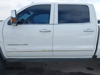 2016 GMC Sierra 2500HD Denali z VIN 1GT12UE88GF170375, wystawiony jako IAAI lot #41885873 z przebiegiem 150 108 mil mil oraz . Historia ofert i sprzedaży dostępna na DreamBid. Obrazek 14.