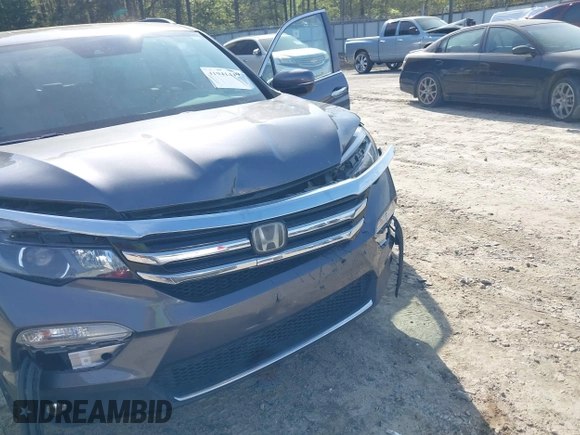 2017 Honda Pilot Touring with VIN 5FNYF5H9XHB046479, listed as a IAAI auction lot 41941449 with 162,554 mi miles. Bid and sale history available at carsss.com. Image 6.