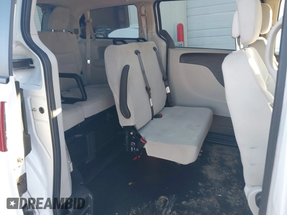 2019 Dodge Grand Caravan SE with VIN 2C7WDGBG7KR803126, listed as a IAAI auction lot 40835937 with 63,100 mi miles and . Bid and sale history available at DreamBid. Image 8.