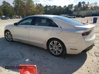 2016 Lincoln MKZ Hybrid with VIN 3LN6L2LU2GR631799, listed as a Copart auction lot 78121914 with 152,464 mi miles and Salvage Title. Bid and sale history available at DreamBid. Image 2.
