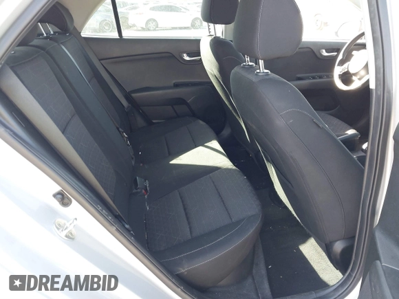 2020 Kia Rio S with VIN 3KPA25AD4LE309303, listed as a IAAI auction lot 41800912 with 75,393 mi miles and . Bid and sale history available at DreamBid. Image 8.