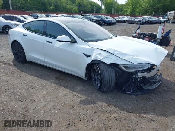 2022 Tesla Model S with VIN 5YJSA1E58NF467644, listed as a IAAI auction lot 42344403 with 52,628 mi miles and . Bid and sale history available at DreamBid. Image 1.