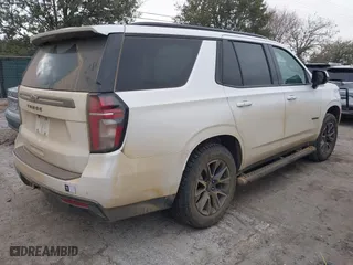 2021 Chevrolet Tahoe Z71 with VIN 1GNSKPKD3MR443411, listed as a IAAI auction lot 41593693 with 118,880 mi miles. Bid and sale history available at carsss.com. Image 4.