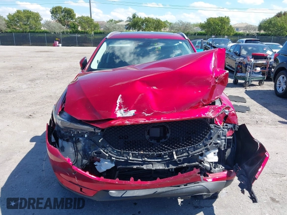 2018 Mazda CX-5 Grand Touring with VIN JM3KFADM0J0377091, listed as a IAAI auction lot 41677544 with 91,758 mi miles. Bid and sale history available at carsss.com. Image 13.