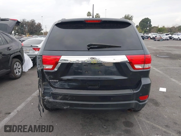 2013 Jeep Grand Cherokee Laredo with VIN 1C4RJEAGXDC620968, listed as a IAAI auction lot 41425270 with 127,739 mi miles. Bid and sale history available at carsss.com. Image 16.