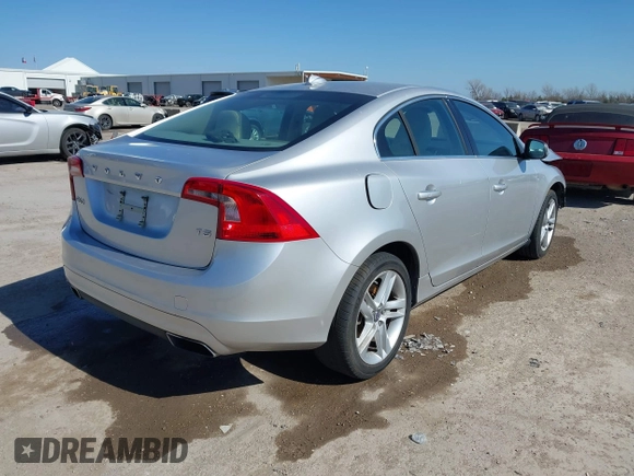 2014 Volvo S60 T5 z VIN YV1612FS3E2290445, wystawiony jako IAAI lot #41615450 z przebiegiem Nie podano mil oraz . Historia ofert i sprzedaży dostępna na DreamBid. Obrazek 4.