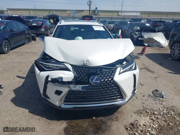 2021 Lexus UX with VIN JTHX9JBH9M2040678, listed as a IAAI auction lot 41727164 with 71,004 mi miles. Bid and sale history available at carsss.com. Image 12.