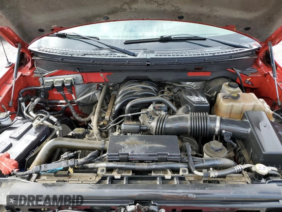 2009 Ford F-150 STX with VIN 1FTRX12869FB02974, listed as a Copart auction lot 52781725 with 130,583 mi miles and Salvage title. Bid and sale history available at DreamBid. Image 11.