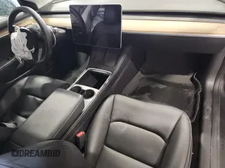 2023 Tesla Model 3 with VIN 5YJ3E1EA4PF554840, listed as a Copart auction lot 63731175 with Not provided miles and Salvage title. Bid and sale history available at DreamBid. Image 8.
