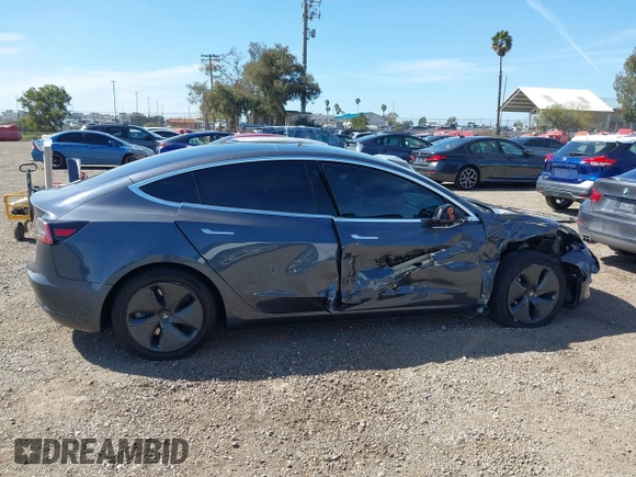 2020 Tesla Model 3 Standard Range Plus with VIN 5YJ3E1EA5LF644282, listed as a IAAI auction lot 41710124 with 69,969 mi miles and . Bid and sale history available at DreamBid. Image 12.