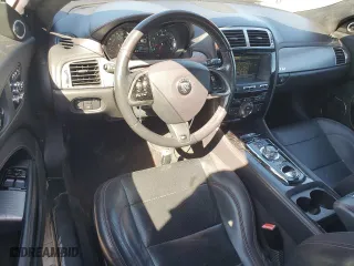 2015 Jaguar XK with VIN SAJWA4DCXFMB55227, listed as a Copart auction lot 48455465 with 64,050 mi miles and Salvage Title. Bid and sale history available at carsss.com. Image 8.
