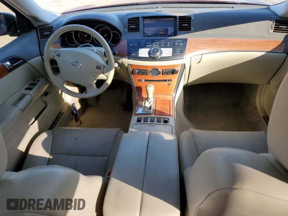 2007 Infiniti M x with VIN JNKAY01F67M453489, listed as a Copart auction lot 74777194 with 148,624 mi miles and Salvage Title. Bid and sale history available at DreamBid. Image 8.
