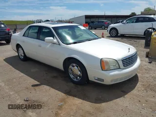 2002 Cadillac DeVille with VIN 1G6KD54Y42U141596, listed as a IAAI auction lot 41989690 with 169,862 mi miles. Bid and sale history available at carsss.com. Image 1.
