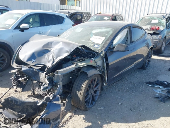 2022 Tesla Model 3 Performance with VIN 5YJ3E1EC3NF194197, listed as a IAAI auction lot 41825401 with Not Provided miles and . Bid and sale history available at DreamBid. Image 2.