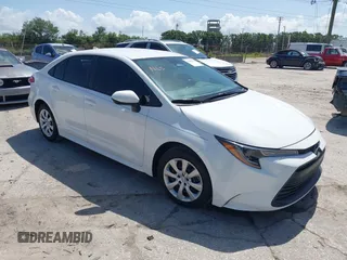2023 Toyota Corolla LE with VIN 5YFB4MDE1PP058810, listed as a IAAI auction lot 42009318 with 10,950 mi miles. Bid and sale history available at carsss.com. Image 1.