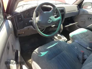 2002 Toyota Tacoma z VIN 5TENL42N82Z142550, wystawiony jako Copart lot #58153195 z przebiegiem 266 617 mil mil oraz Nie do naprawy • Non repairable. Historia ofert i sprzedaży dostępna na DreamBid. Obrazek 8.