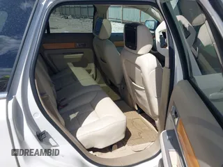 2007 Lincoln MKX with VIN 2LMDU88CX7BJ22585, listed as a IAAI auction lot 42061572 with 148,029 mi miles. Bid and sale history available at carsss.com. Image 8.