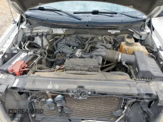 2013 Ford F-150 XL with VIN 1FTEW1CM7DKD94874, listed as a Copart auction lot 63659855 with 227,648 mi miles and Salvage title. Bid and sale history available at DreamBid. Image 11.