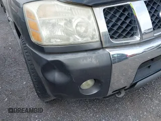 2005 Nissan Titan LE z VIN 1N6AA07B05N557667, wystawiony jako IAAI lot #42292562 z przebiegiem 197 874 mil mil oraz . Historia ofert i sprzedaży dostępna na DreamBid. Obrazek 13.