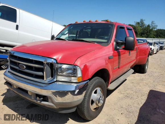 2003 Ford F-350 XL with VIN 1FTWW33P63EC65547, listed as a Copart auction lot 73002754 with 184,482 mi miles and Salvage Title. Bid and sale history available at DreamBid. Image 1.