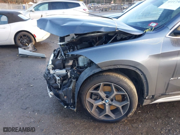 2016 BMW X1 xDrive28i with VIN WBXHT3C30GP881837, listed as a IAAI auction lot 41117389 with 84,157 mi miles. Bid and sale history available at carsss.com. Image 19.