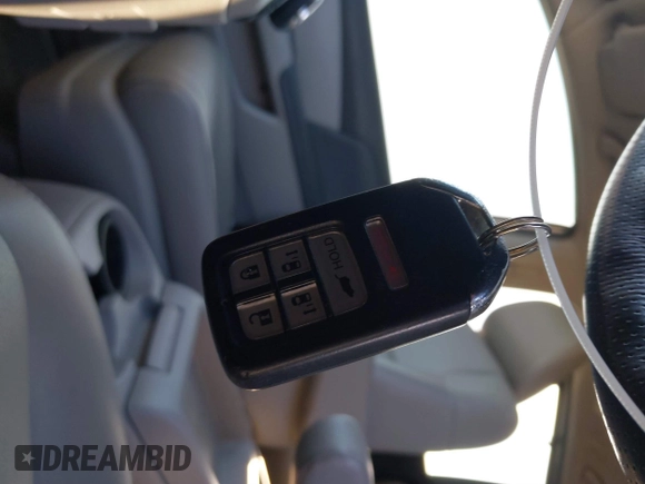 2014 Honda Odyssey Touring with VIN 5FNRL5H95EB108427, listed as a IAAI auction lot 39992643 with 100,658 mi miles and . Bid and sale history available at DreamBid. Image 11.