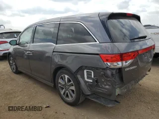 2015 Honda Odyssey Touring Elite z VIN 5FNRL5H96FB047204, wystawiony jako Copart lot #56297985 z przebiegiem 125 482 mil mil oraz Szkoda całkowita • Salvage title. Historia ofert i sprzedaży dostępna na DreamBid. Obrazek 2.