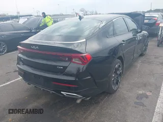 2024 Kia K5 GT-Line z VIN 5XXG64J22RG257080, wystawiony jako IAAI lot #42026127 z przebiegiem 19 477 mil mil oraz . Historia ofert i sprzedaży dostępna na DreamBid. Obrazek 4.