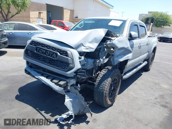 2020 Toyota Tacoma SR5 with VIN 3TMBZ5DN7LM025500, listed as a IAAI auction lot 42651731 with 54,879 mi miles and . Bid and sale history available at DreamBid. Image 6.