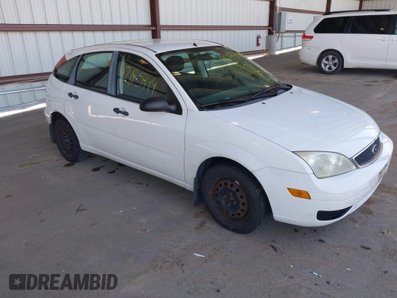 2007 Ford Focus S z VIN 1FAFP37N97W238404, wystawiony jako IAAI lot #42195944 z przebiegiem 168 390 mil mil oraz . Historia ofert i sprzedaży dostępna na DreamBid. Obrazek 1.
