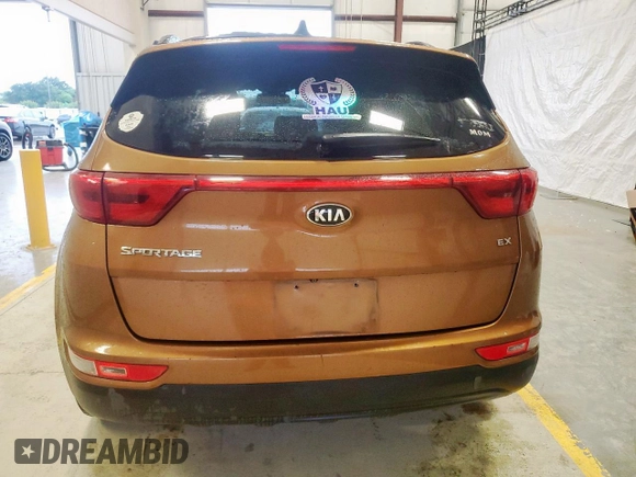 2018 Kia Sportage EX z VIN KNDPN3AC9J7359821, wystawiony jako Copart lot #60549715 z przebiegiem 88 601 mil mil oraz Czysty tytuł • Clean title. Historia ofert i sprzedaży dostępna na DreamBid. Obrazek 6.