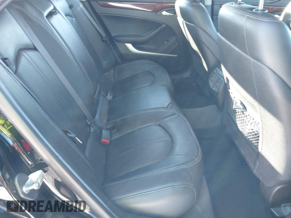 2013 Cadillac CTS Premium z VIN 1G6DS5E34D0160676, wystawiony jako IAAI lot #41262795 z przebiegiem 122 248 mil mil oraz . Historia ofert i sprzedaży dostępna na DreamBid. Obrazek 8.