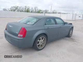 2006 Chrysler 300 with VIN 2C3KA43R56H217771, listed as a IAAI auction lot 41859397 with 154,227 mi miles. Bid and sale history available at carsss.com. Image 4.