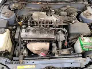 1995 Toyota Corolla DX with VIN JT2AE09V4S0105592, listed as a Copart auction lot 84766944 with 279,417 mi miles and Salvage title. Bid and sale history available at DreamBid. Image 14.