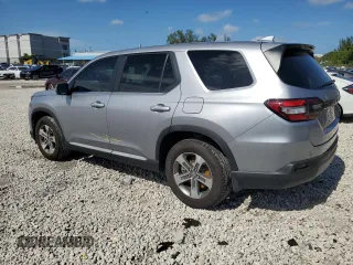 2024 Honda Pilot EX-L 7 Passenger with VIN 5FNYG2H50RB007894, listed as a Copart auction lot 59764574 with 3,801 mi miles and Non Repairable. Bid and sale history available at carsss.com. Image 2.