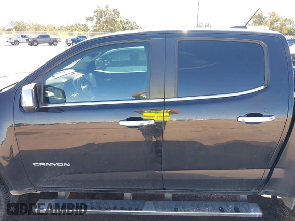 2016 GMC Canyon 2WD SLT with VIN 1GTG5DE35G1184141, listed as a IAAI auction lot 40875490 with 126,747 mi miles. Bid and sale history available at carsss.com. Image 14.