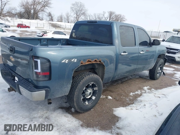 2009 Chevrolet Silverado 1500 LT with VIN 2GCEK233591134697, listed as a IAAI auction lot 41716904 with 211,681 mi miles and . Bid and sale history available at DreamBid. Image 4.