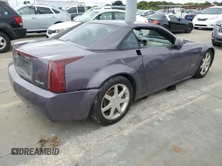 2004 Cadillac XLR z VIN 1G6YV34AX45600514, wystawiony jako Copart lot #74852854 z przebiegiem 37 941 mil mil oraz Nie do naprawy. Historia ofert i sprzedaży dostępna na DreamBid. Obrazek 3.
