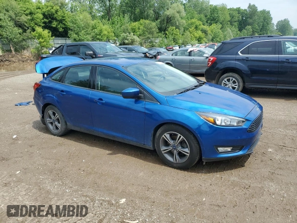 2018 Ford Focus SE with VIN 1FADP3FEXJL282378, listed as a Copart auction lot 59371975 with 30,029 mi miles and Salvage title. Bid and sale history available at DreamBid. Image 4.