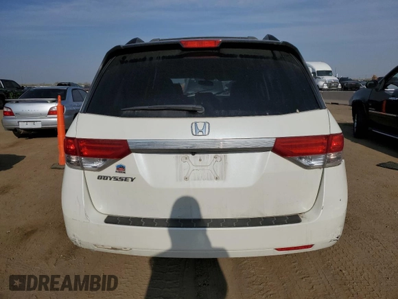 2016 Honda Odyssey with VIN 5FNRL5H62GB143676, listed as a Copart auction lot 54407205 with 113,423 mi miles and Salvage Title. Bid and sale history available at DreamBid. Image 6.