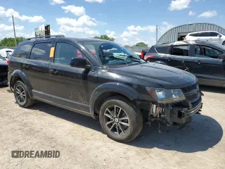 2019 Dodge Journey SE with VIN 3C4PDCBB0KT747252, listed as a Copart auction lot 56652425 with 72,581 mi miles and Salvage title. Bid and sale history available at DreamBid. Image 4.