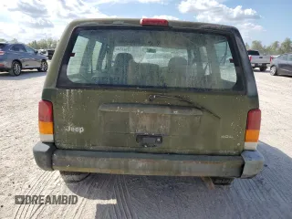 1997 Jeep Cherokee SE with VIN 1J4FT28SXVL540135, listed as a Copart auction lot 77043714 with 0 mi miles and Clean Title. Bid and sale history available at carsss.com. Image 6.