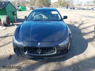 2014 Maserati Ghibli S Q4 with VIN ZAM57RTA1E1091738, listed as a IAAI auction lot 41518359 with 75,641 mi miles. Bid and sale history available at carsss.com. Image 12.