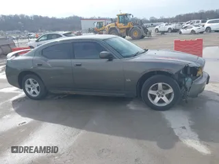 2010 Dodge Charger SXT with VIN 2B3CA3CV0AH234012, listed as a IAAI auction lot 41670267 with 202,182 mi miles and . Bid and sale history available at carsss.com. Image 14.
