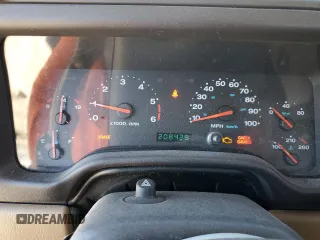 2002 Jeep Wrangler Sahara with VIN 1J4FA59S02P761365, listed as a Copart auction lot 81899144 with 208,429 mi miles and Salvage title. Bid and sale history available at DreamBid. Image 9.