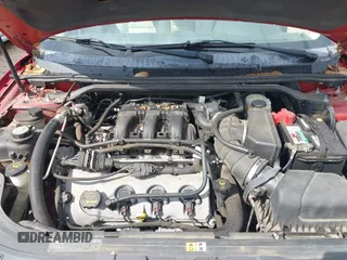 2009 Mercury Sable Premier with VIN 1MEHM42W89G628794, listed as a IAAI auction lot 42177538 with 127,232 mi miles and . Bid and sale history available at DreamBid. Image 10.