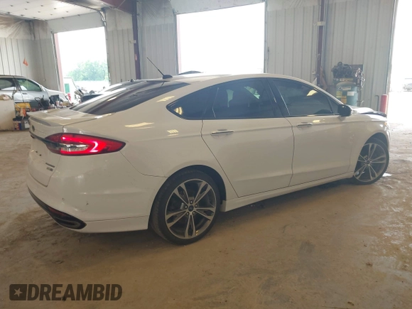 2017 Ford Fusion Titanium with VIN 3FA6P0D9XHR136815, listed as a IAAI auction lot 42596651 with 109,608 mi miles and . Bid and sale history available at DreamBid. Image 4.