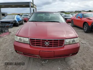 2002 Cadillac Seville Touring STS z VIN 1G6KY54902U132357, wystawiony jako Copart lot #42008795 z przebiegiem 111 014 mil mil oraz Szkoda całkowita • Salvage title. Historia ofert i sprzedaży dostępna na DreamBid. Obrazek 5.