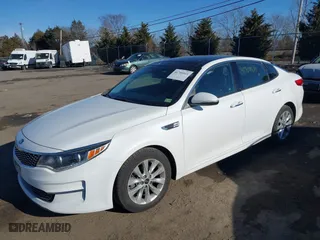 2017 Kia Optima EX with VIN 5XXGU4L30HG126899, listed as a IAAI auction lot 41701811 with 115,196 mi miles. Bid and sale history available at carsss.com. Image 2.